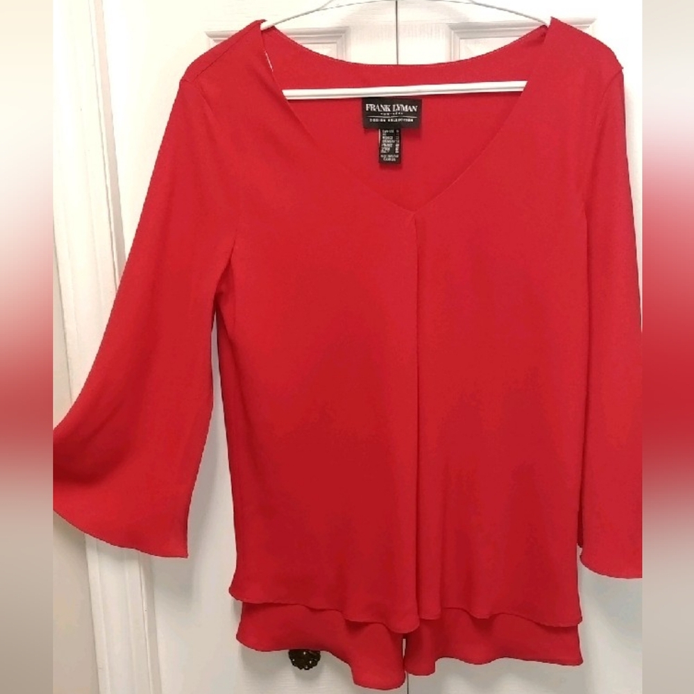 Frank Lyman Designs red blouse.